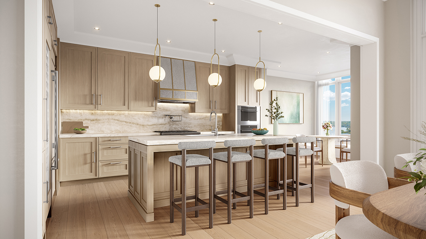 Kitchen shot with bright lights and beige cabinetry and light gray seating