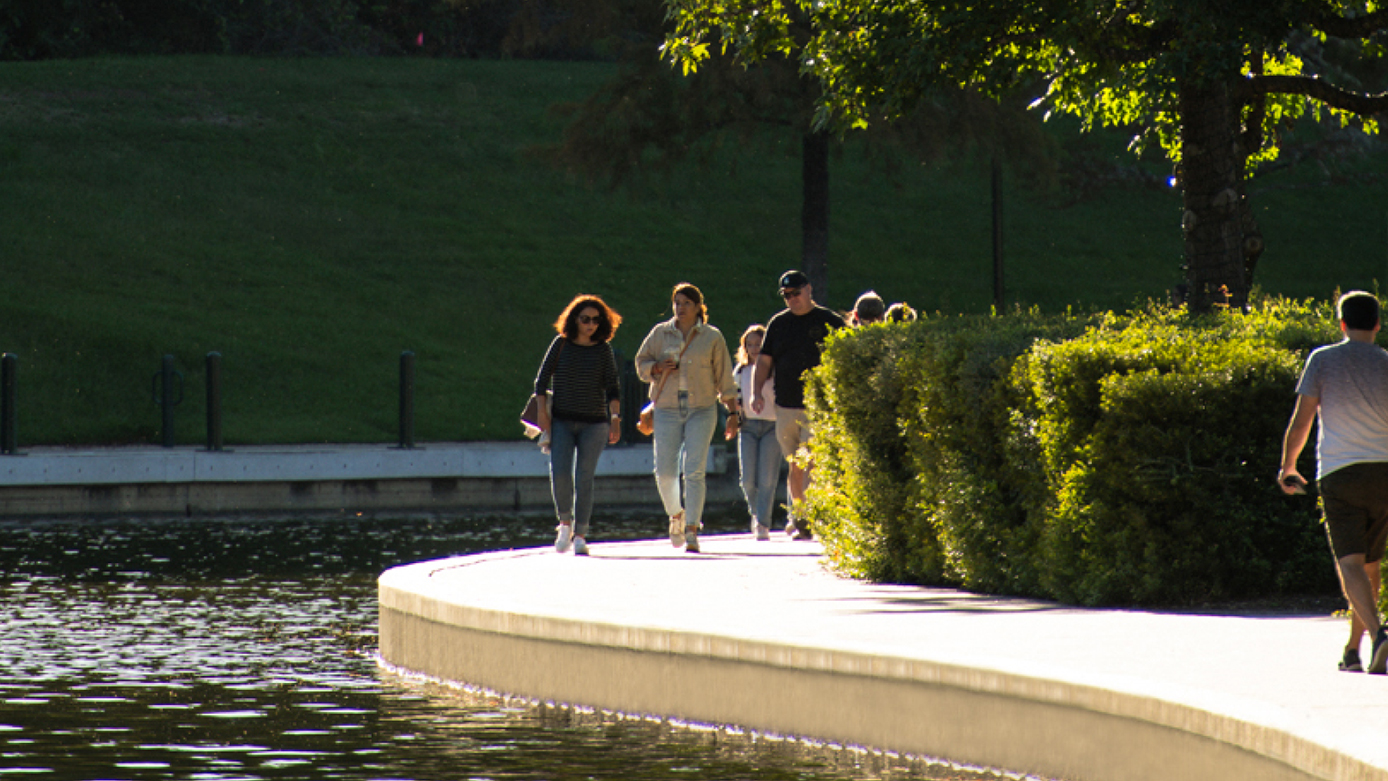 People walking along the waterway